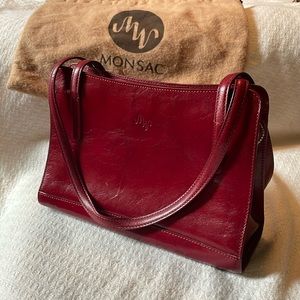 MONSAC small red leather shoulder bag with dust bag.